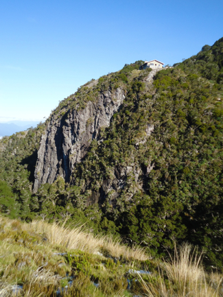 Alpine hut up on granite promontory