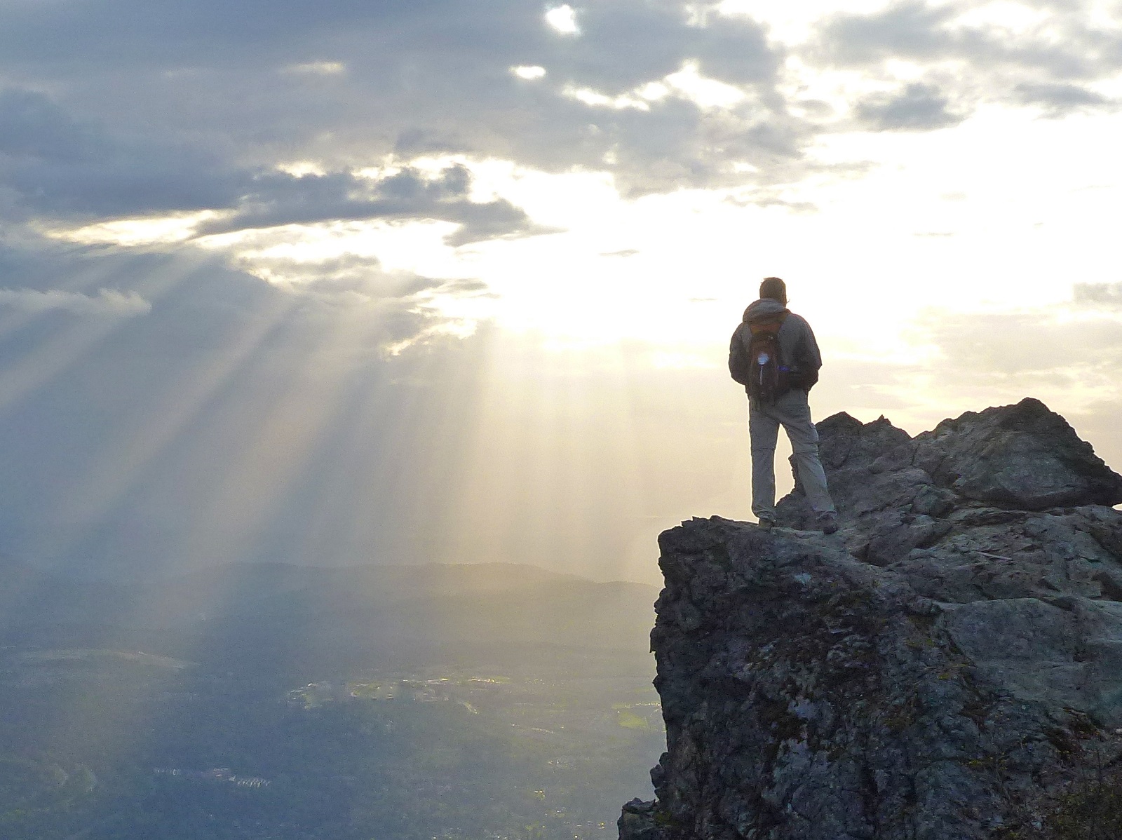 Man Watching Sunrays