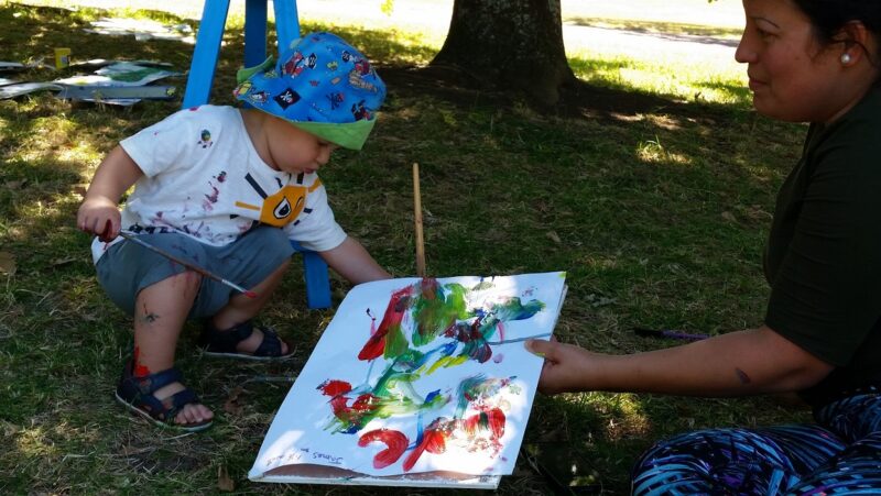 Little boy with his painting